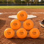 CYFIE weighted softball training balls beside a bat and pitcher's glove on a softball practice field