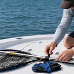 CYFIE telescopic fishing gaff secured beside landing gear on a clean fishing boat deck