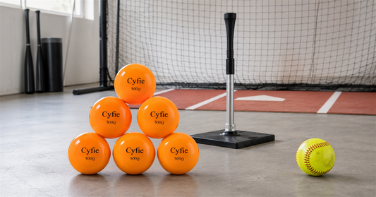 CYFIE weighted softballs beside a batting tee during a controlled hitting drill