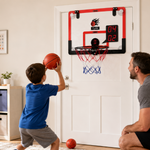 Child practicing at a correctly positioned CYFIE mini basketball hoop with adult supervision