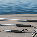 Telescopic fishing gaff and compatible hook arranged for comparison