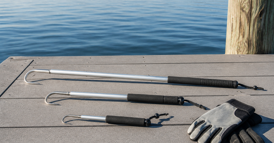 Telescopic fishing gaff and compatible hook arranged for comparison