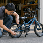 Adult checking the lean and clearance of a kickstand on a small bicycle